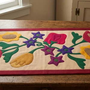 Fall Bouquet quilt 8 Fall Bouquet Quilt: Create a stunning 30-1/2 inch wall hanging with Janet Nesbitt's primitive appliqué pattern. Perfect for autumn home decor.