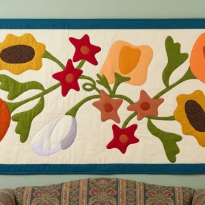 Fall Bouquet quilt 3 Fall Bouquet Quilt: Create a stunning 30-1/2 inch wall hanging with Janet Nesbitt's primitive appliqué pattern. Perfect for autumn home decor.